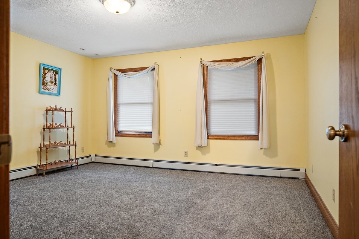 10739-451 North 1300 E Road Chenoa, IL 61726 - Photo 30 of 55 an empty room with windows