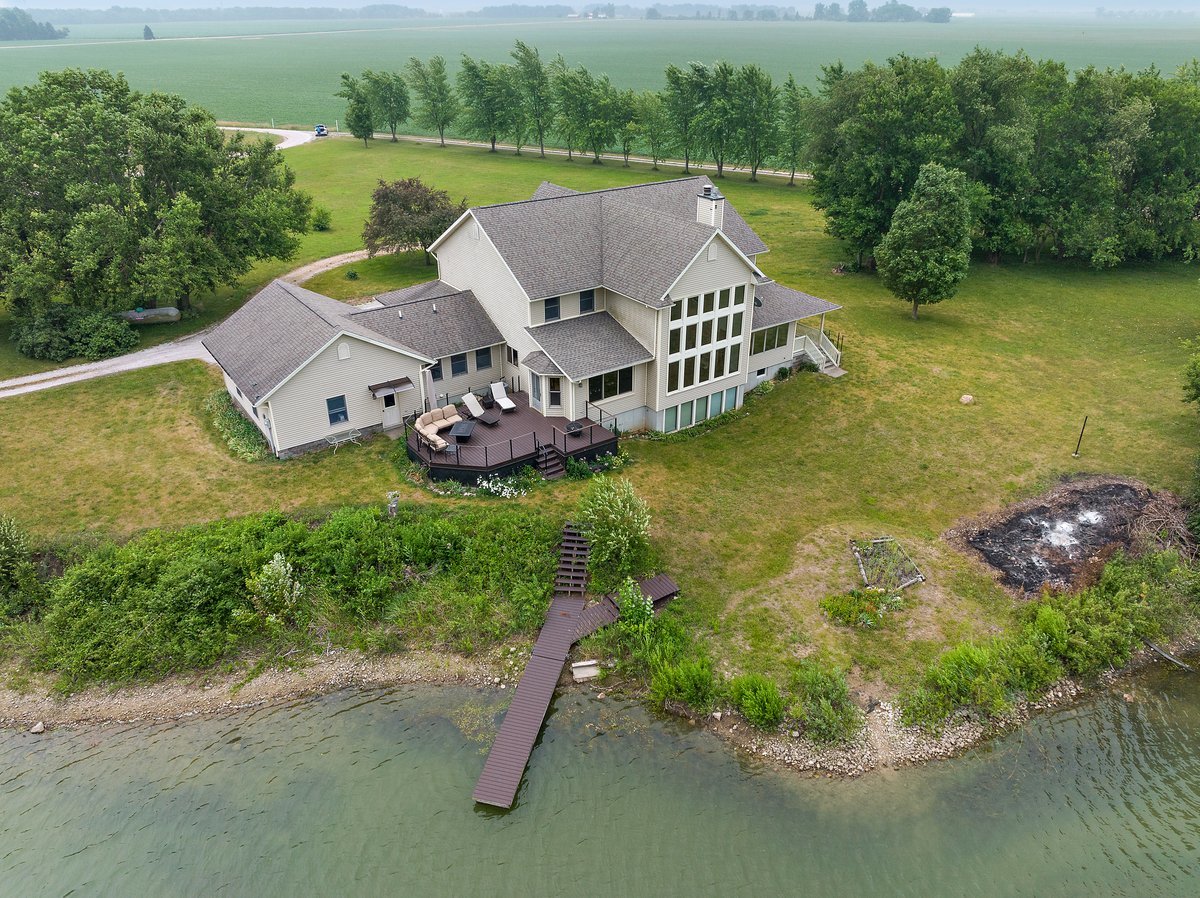 10739-451 North 1300 E Road Chenoa, IL 61726 - Photo 3 of 55 an aerial view of a house with pool lake view and mountain view