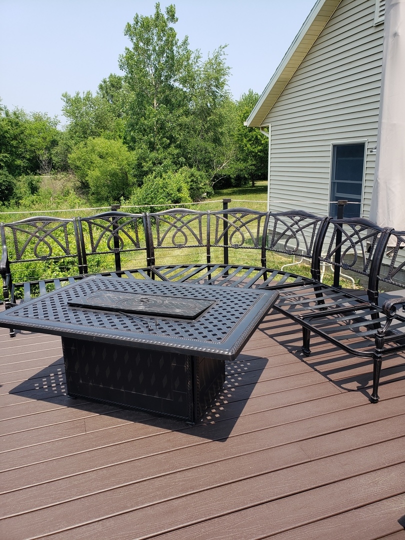10739-451 North 1300 E Road Chenoa, IL 61726 - Photo 40 of 55 a view of a wooden deck with furniture