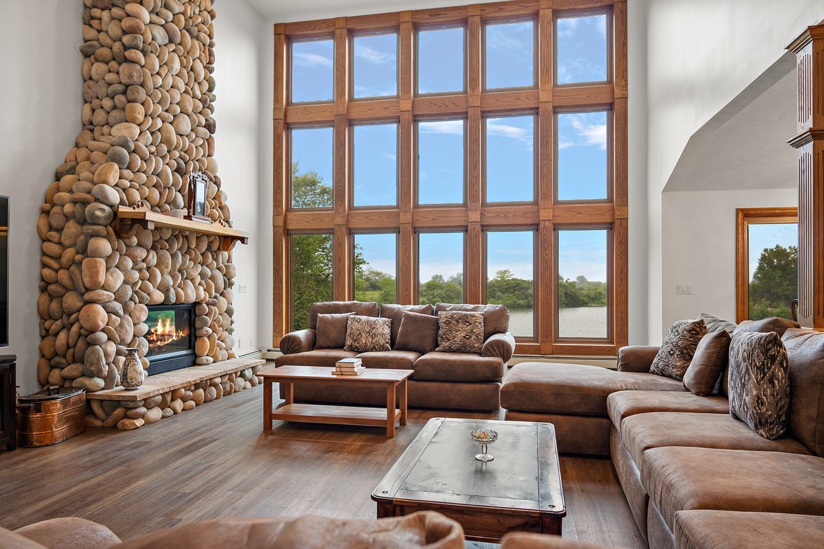 10739-451 North 1300 E Road Chenoa, IL 61726 - Photo 7 of 55 a living room with furniture and a floor to ceiling window