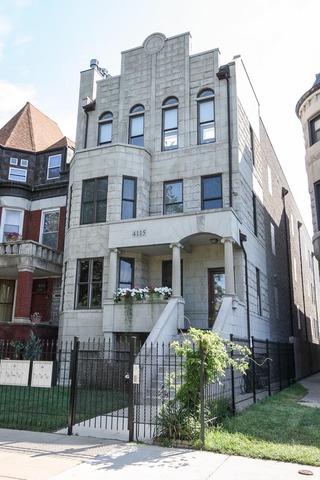 4115 South Drexel Boulevard, Unit 2F Chicago, IL 60653 - Photo 1 of 17 a front view of a building with a garden