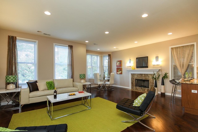 4115 South Drexel Boulevard, Unit 2F Chicago, IL 60653 - Photo 2 of 17 a living room with furniture fireplace and a table