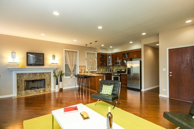 4115 South Drexel Boulevard, Unit 2F Chicago, IL 60653 - Photo 5 of 17 a lobby with furniture wooden floor and a fireplace