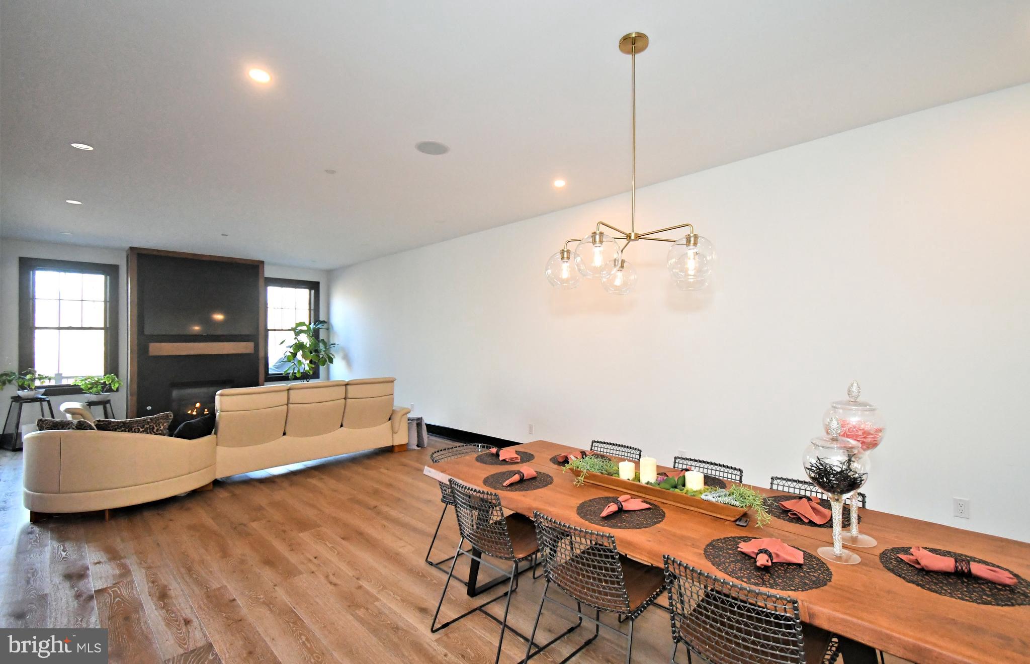10 Richards Way Ambler, PA 19002 - Photo 13 of 73 a view of a dining room with furniture wooden floor and chandelier
