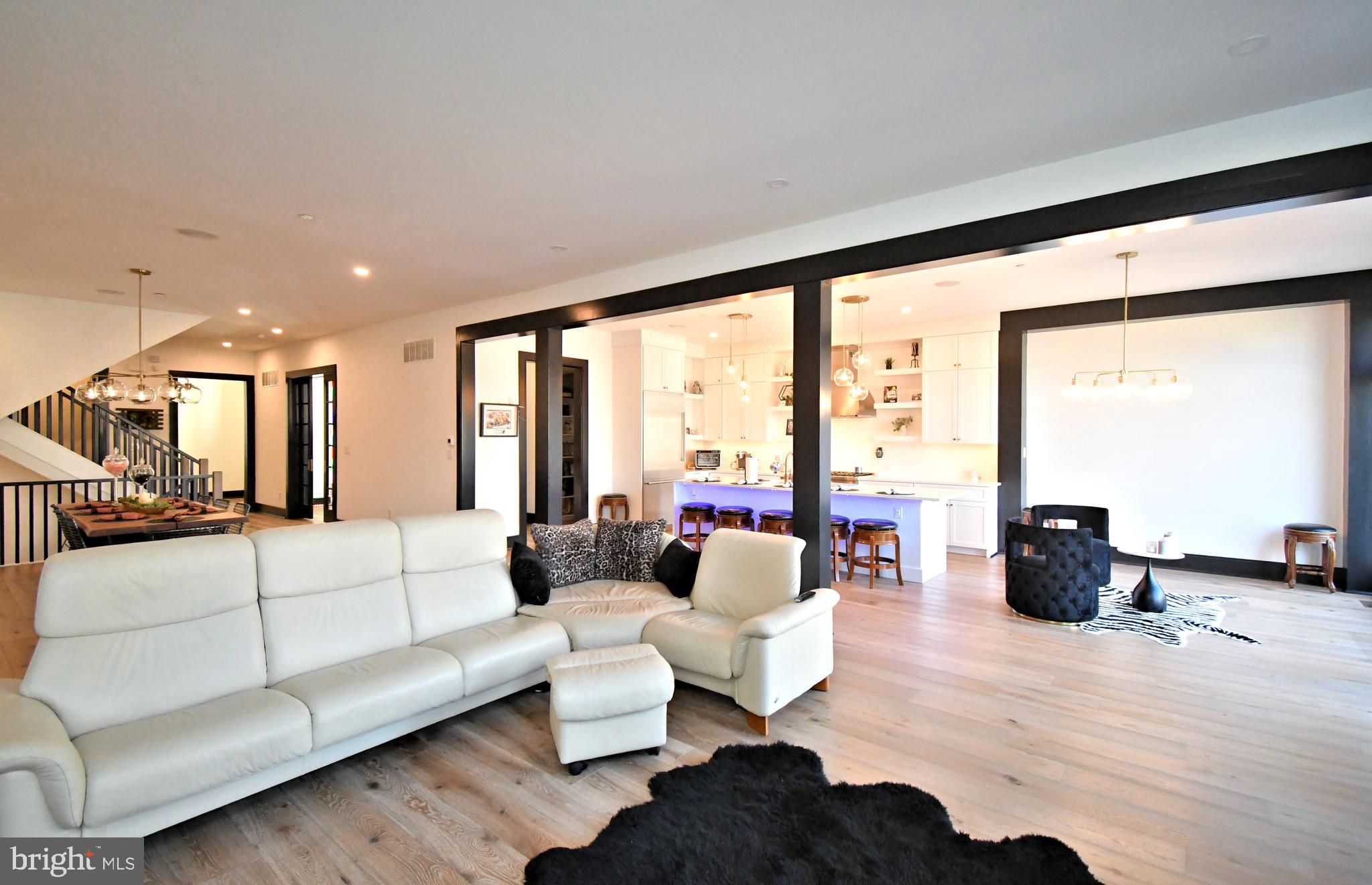 10 Richards Way Ambler, PA 19002 - Photo 15 of 73 a living room with furniture and large windows