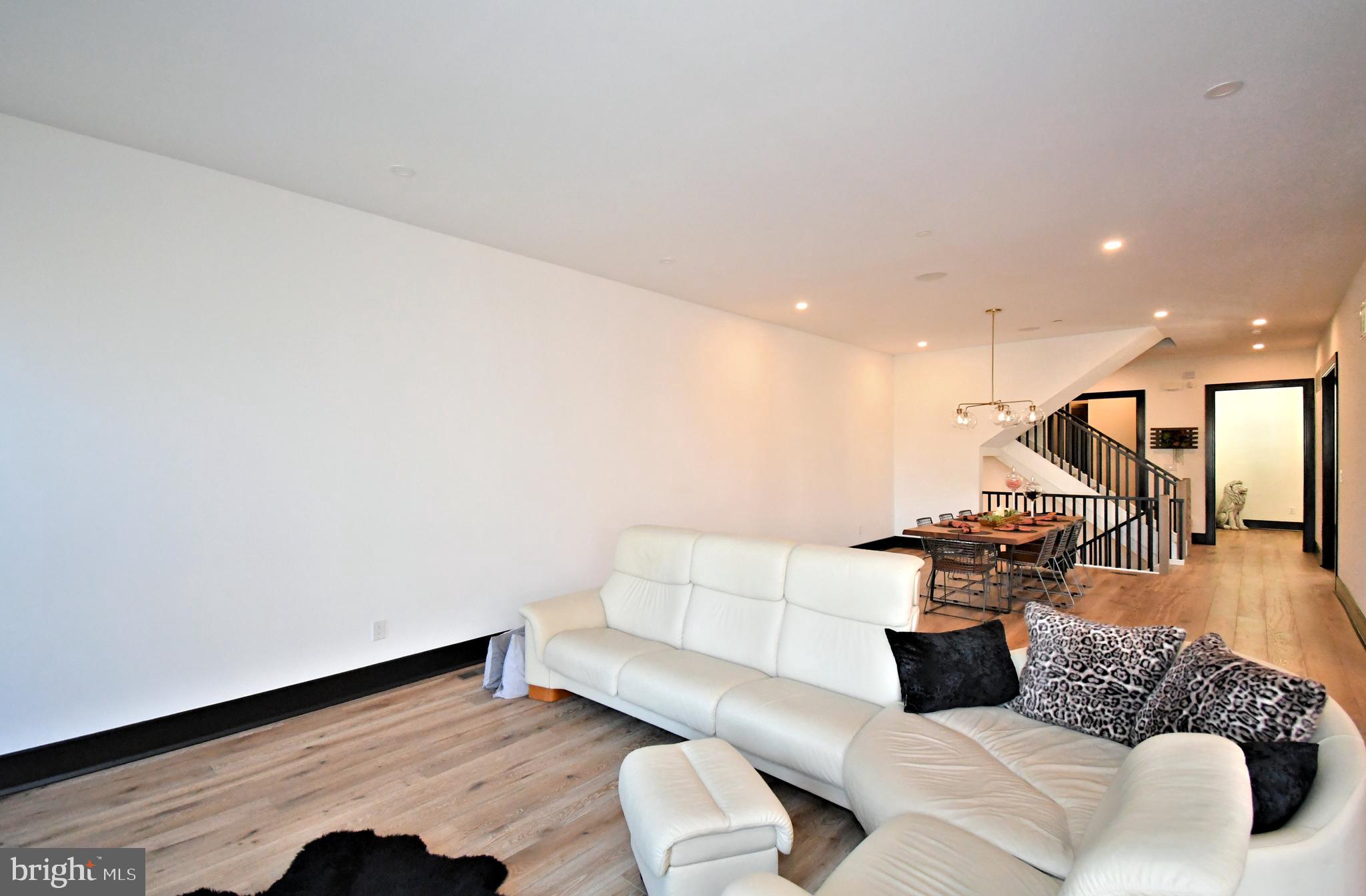 10 Richards Way Ambler, PA 19002 - Photo 16 of 73 a living room with furniture and wooden floor