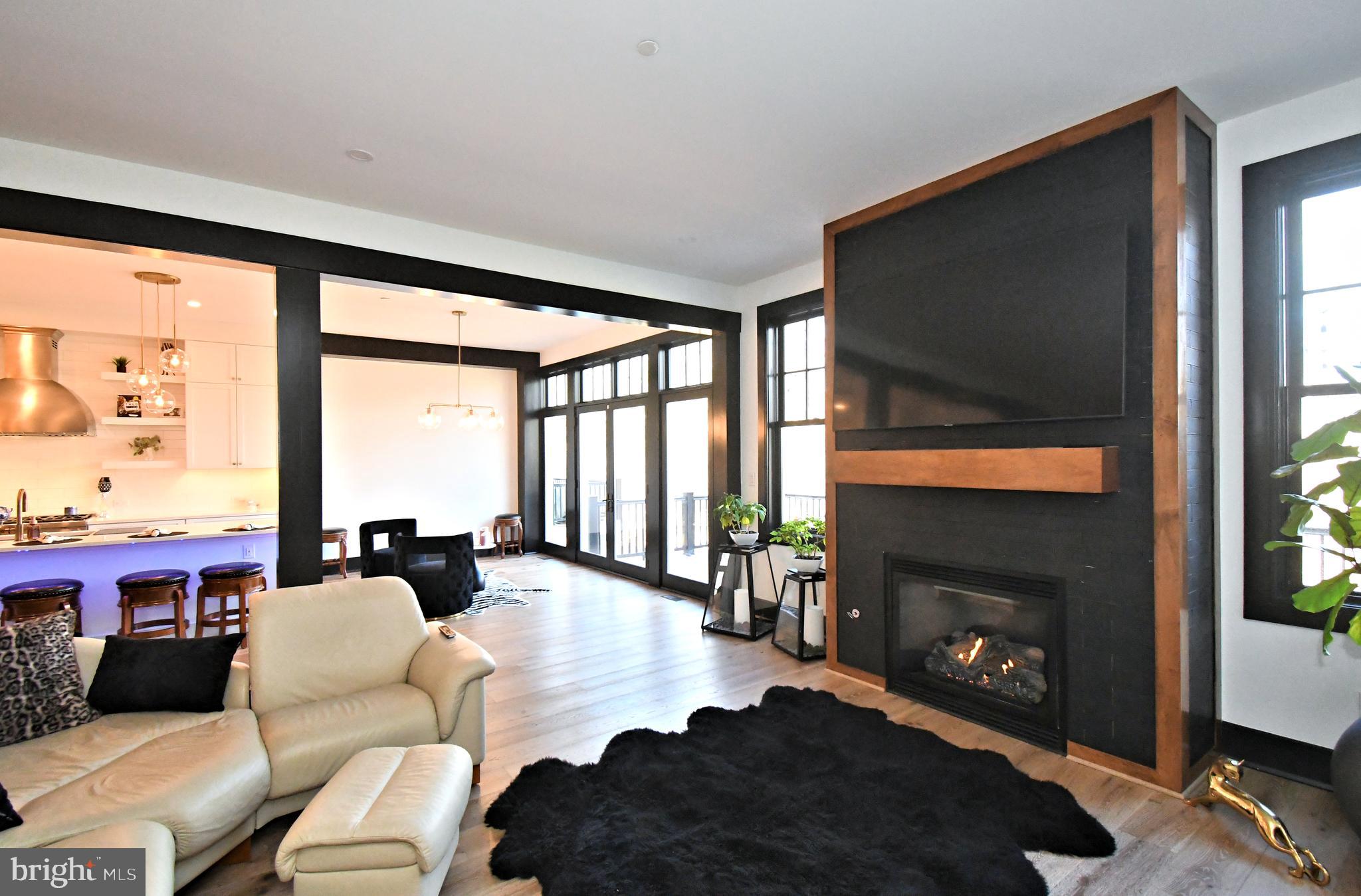 10 Richards Way Ambler, PA 19002 - Photo 17 of 73 a living room with furniture fireplace and a large window
