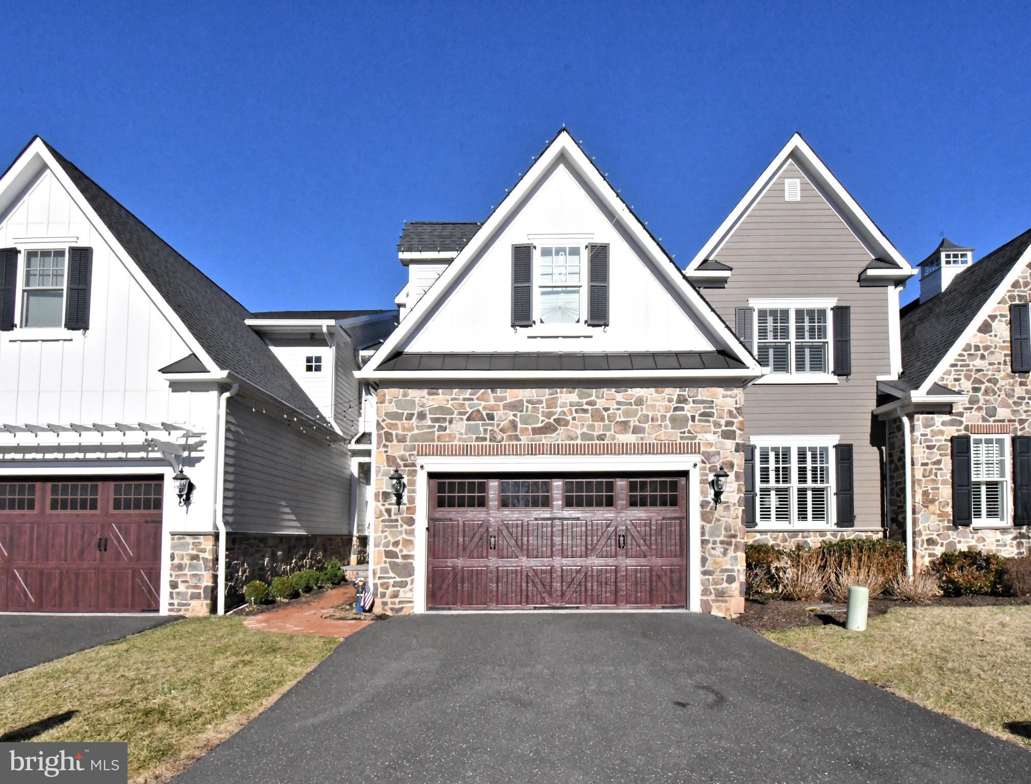 10 Richards Way Ambler, PA 19002 - Photo 2 of 73 a view of a house with a yard and garage