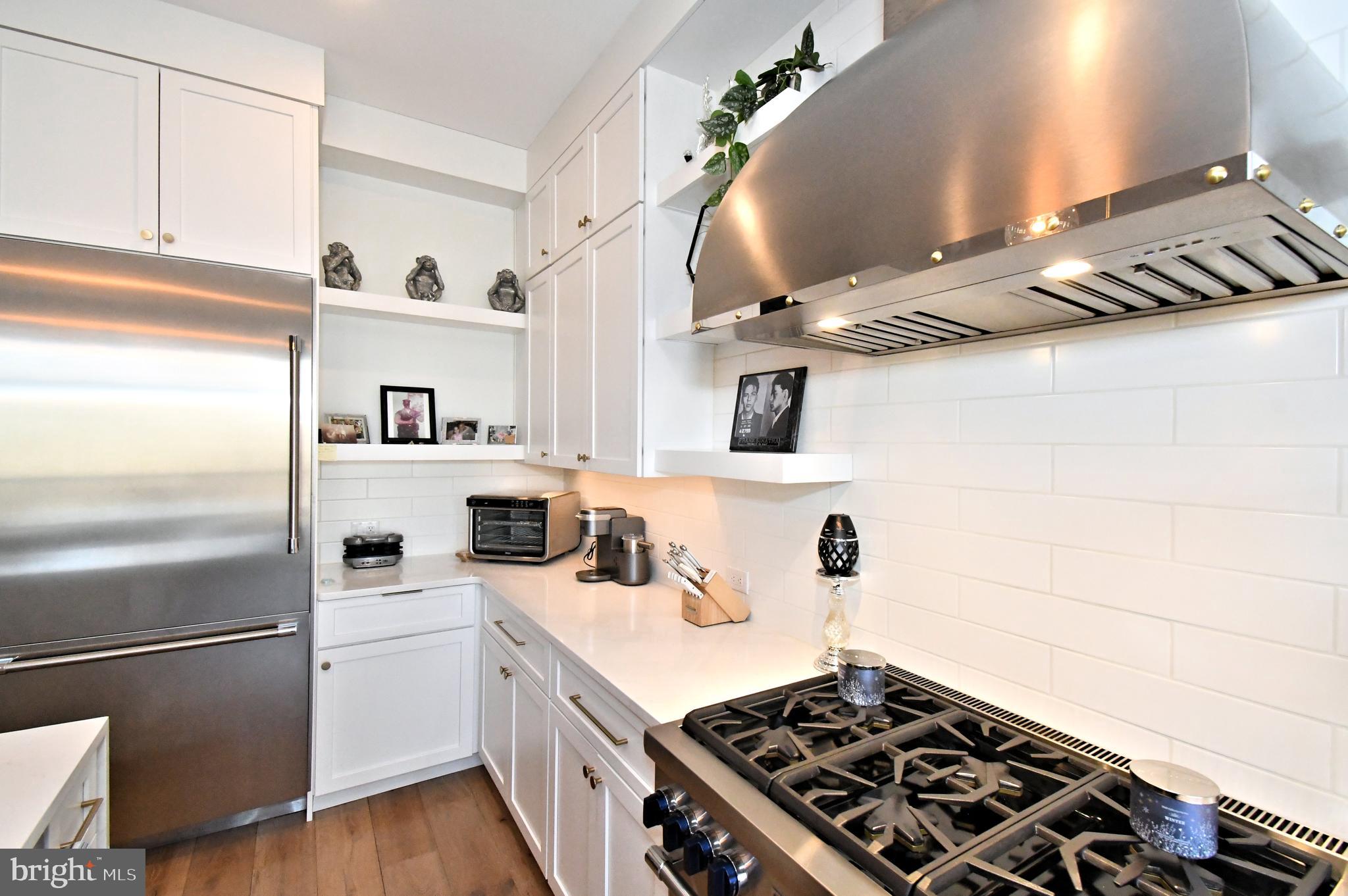 10 Richards Way Ambler, PA 19002 - Photo 24 of 73 a kitchen with a stove and a refrigerator