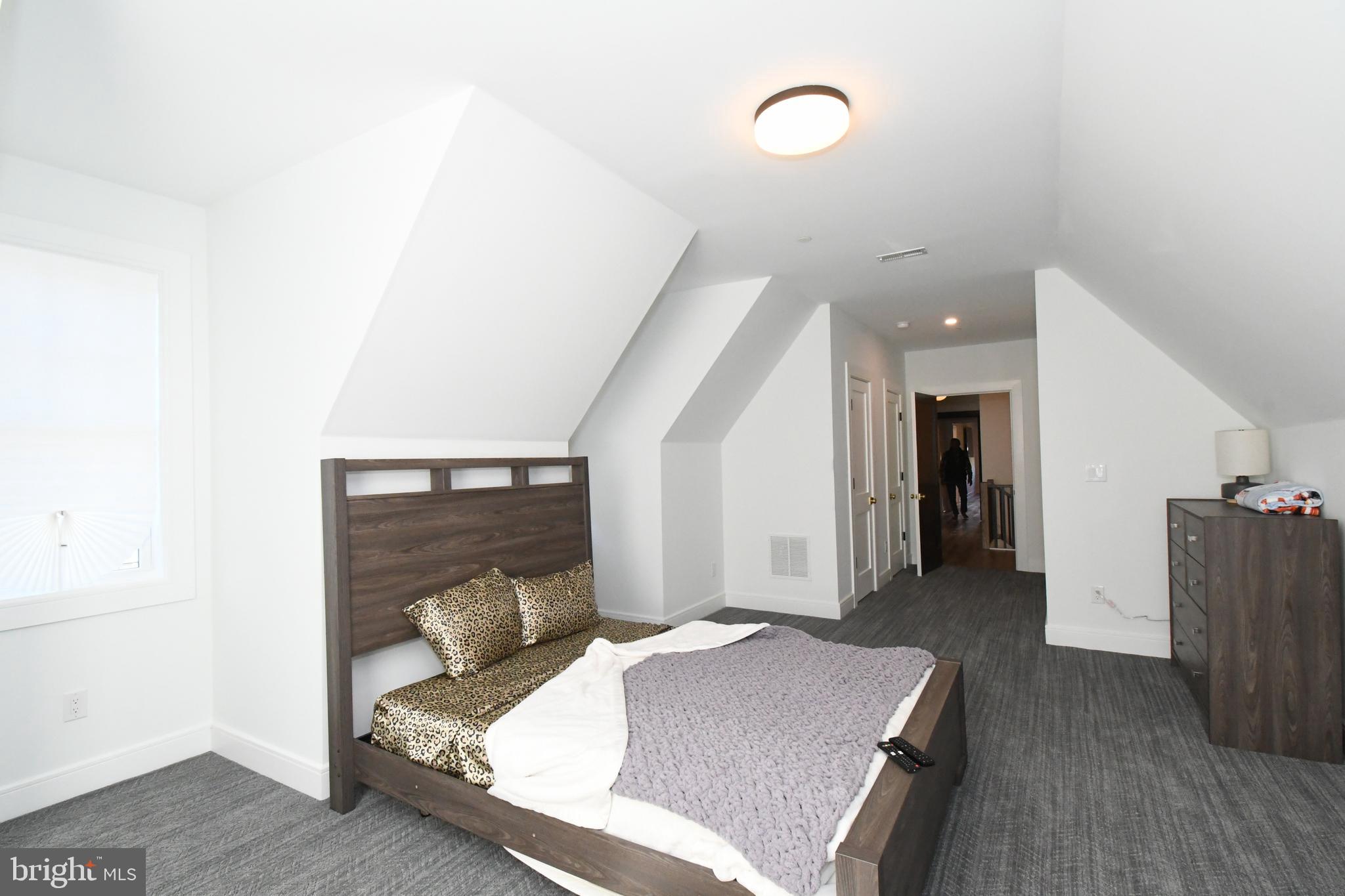 10 Richards Way Ambler, PA 19002 - Photo 48 of 73 a bedroom with a bed and a mirror