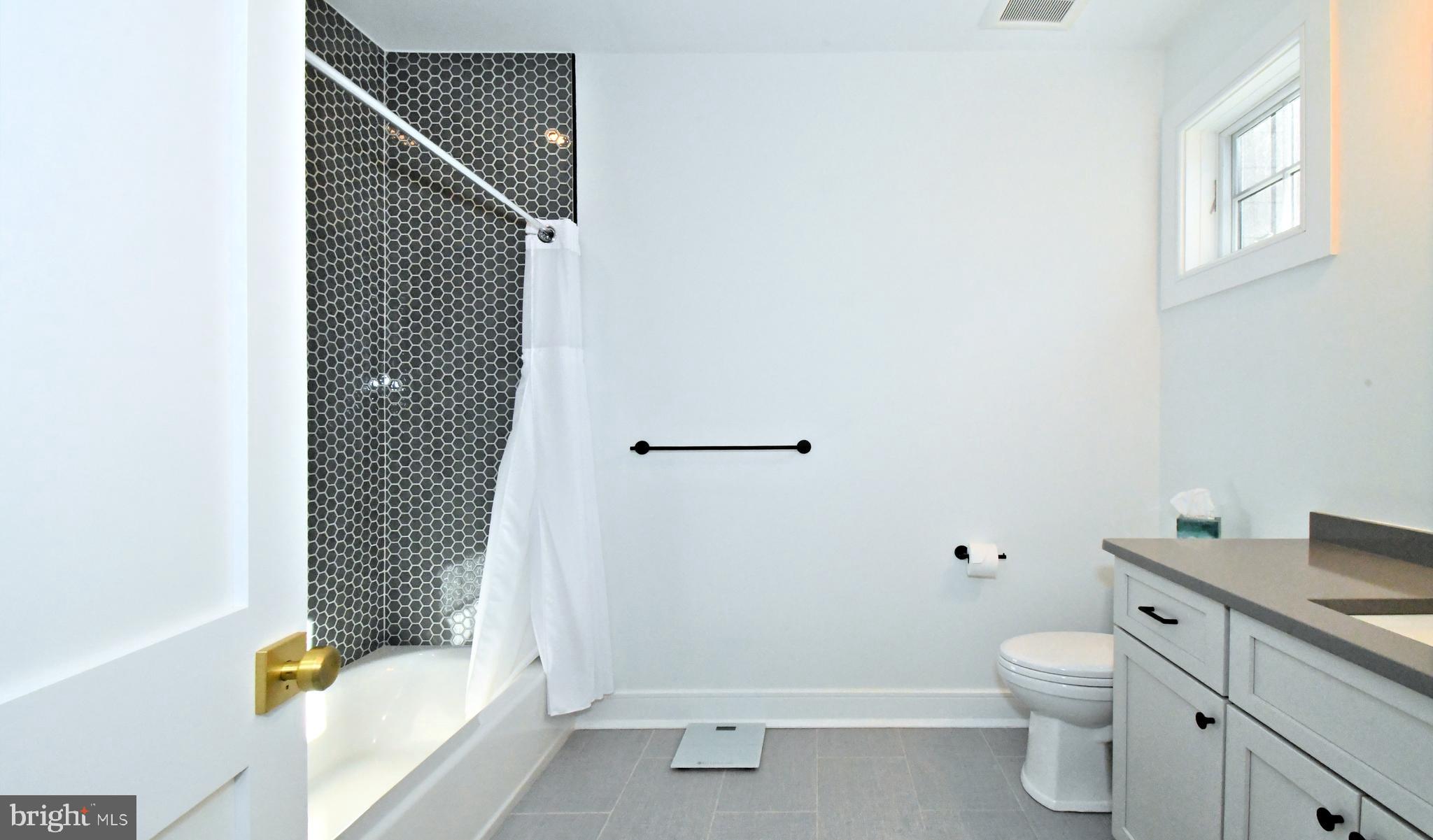 10 Richards Way Ambler, PA 19002 - Photo 51 of 73 a bathroom with a granite countertop toilet and a shower