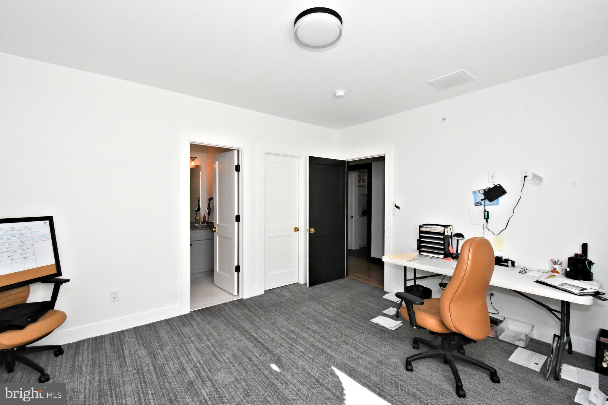 10 Richards Way Ambler, PA 19002 - Photo 55 of 73 a view of a workspace with furniture and wooden floor
