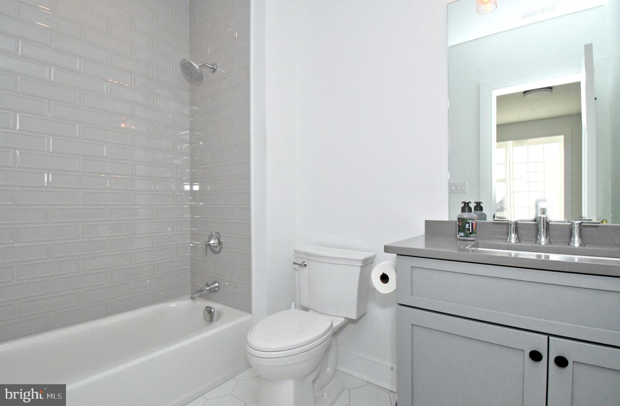 10 Richards Way Ambler, PA 19002 - Photo 56 of 73 a bathroom with a sink a toilet and shower