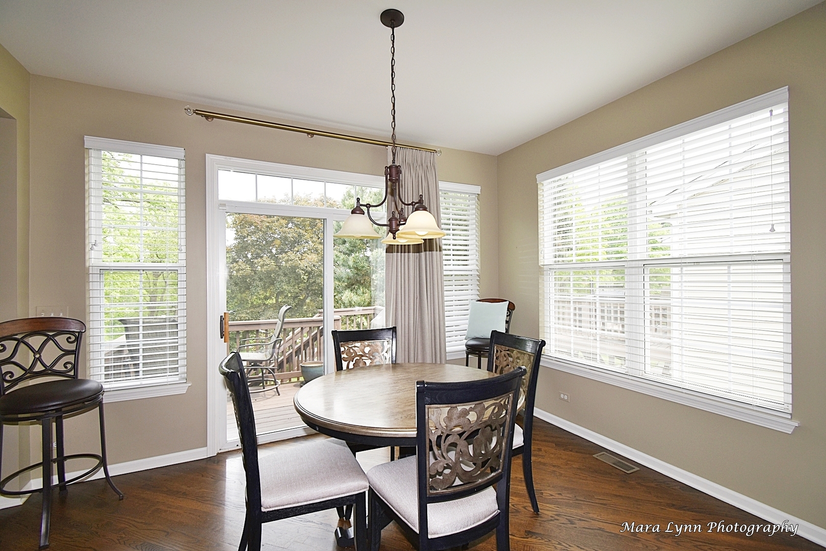 714 Viewpointe Drive St. Charles, IL 60174 - Photo 11 of 31 a dining room with furniture window wooden floor