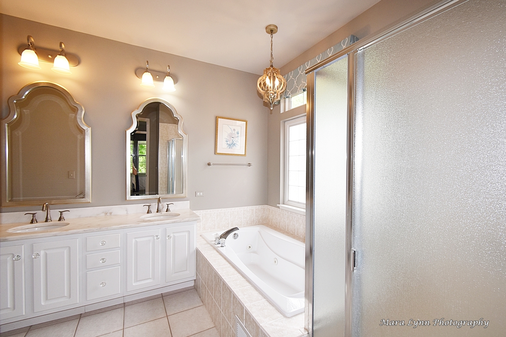 714 Viewpointe Drive St. Charles, IL 60174 - Photo 14 of 31 a spacious bathroom with a granite countertop sink a large mirror and a bathtub with shower