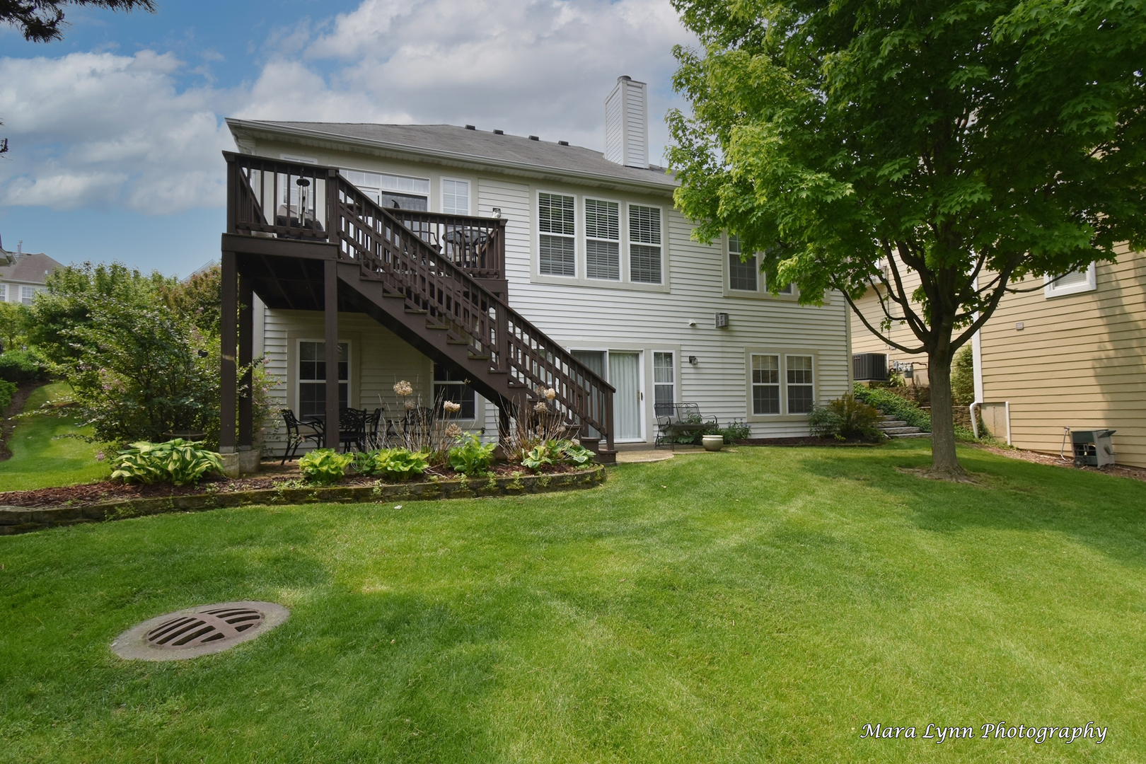 714 Viewpointe Drive St. Charles, IL 60174 - Photo 29 of 31 a view of a house with a yard