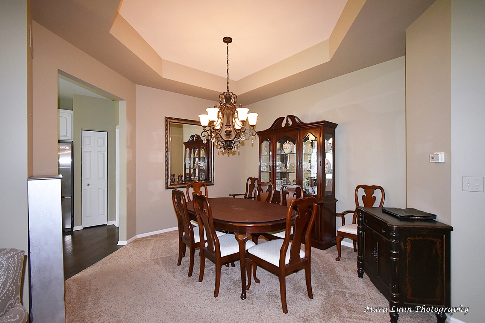 714 Viewpointe Drive St. Charles, IL 60174 - Photo 7 of 31 a view of a dining room with furniture and chandelier
