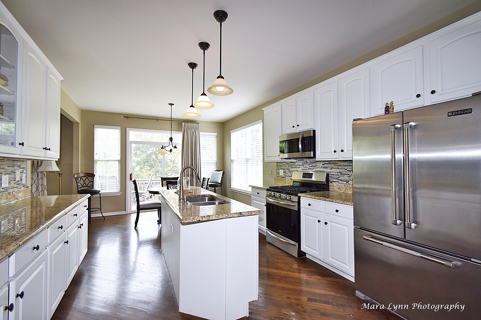 714 Viewpointe Drive St. Charles, IL 60174 - Photo 8 of 31 a kitchen with stainless steel appliances granite countertop a sink stove and refrigerator
