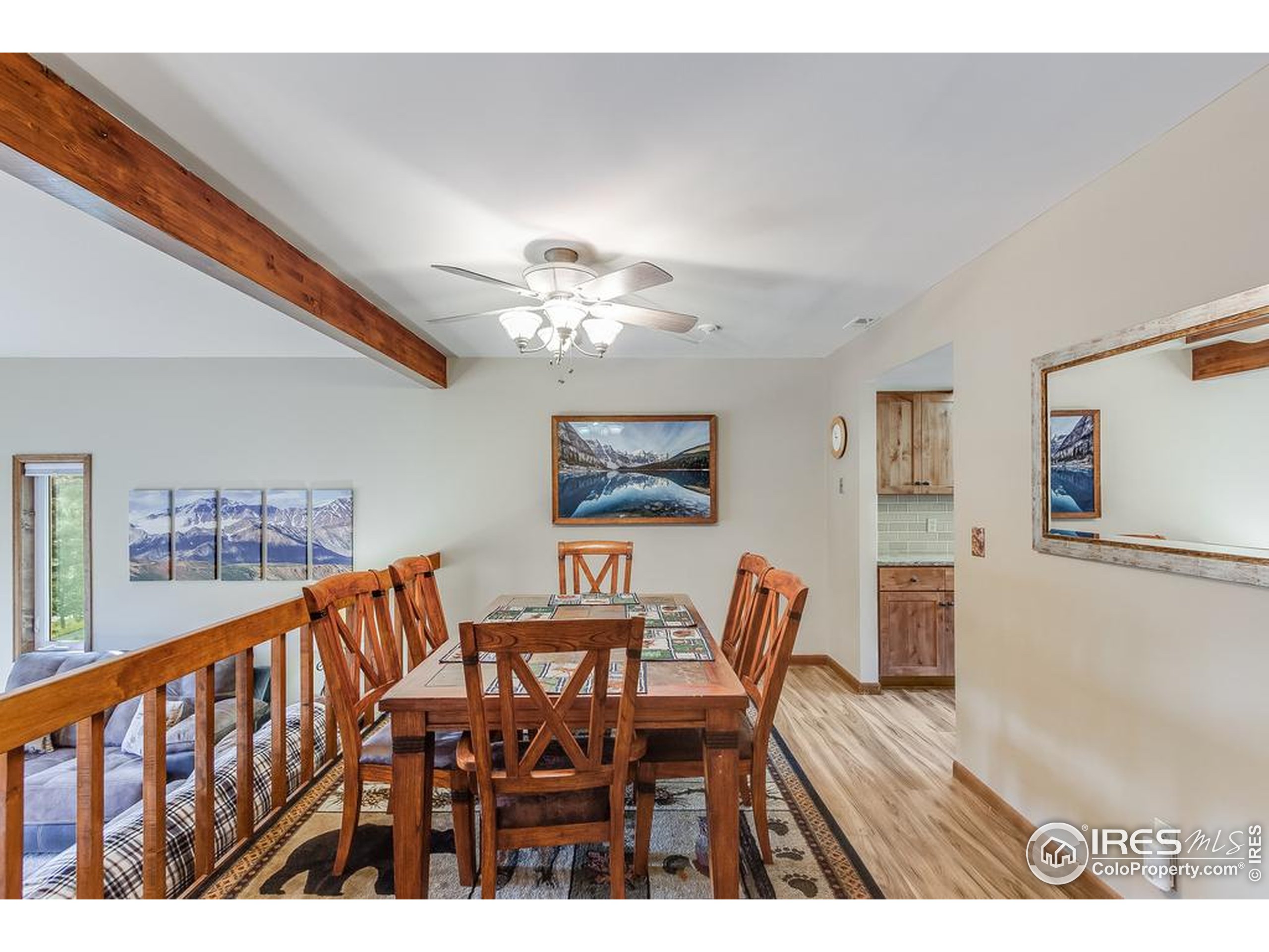 1070 Crestview Court, Unit 4 Estes Park, CO 80517 - Photo 10 of 28 a view of a dining room with furniture and chandelier