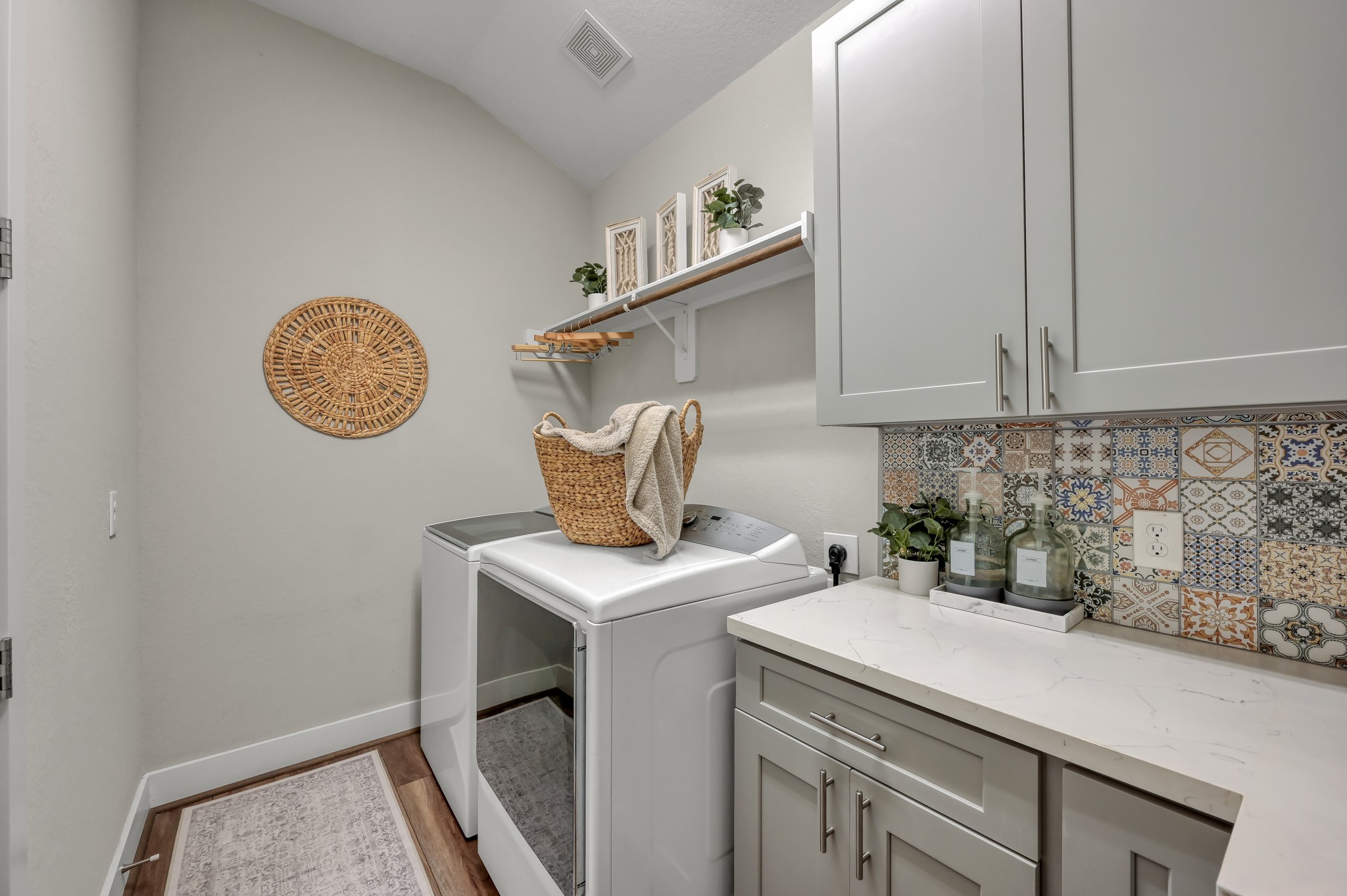 12469 Pebble View Drive Conroe, TX 77304 - Photo 27 of 41 Laundry room off the kitchen. Plenty of storage space.