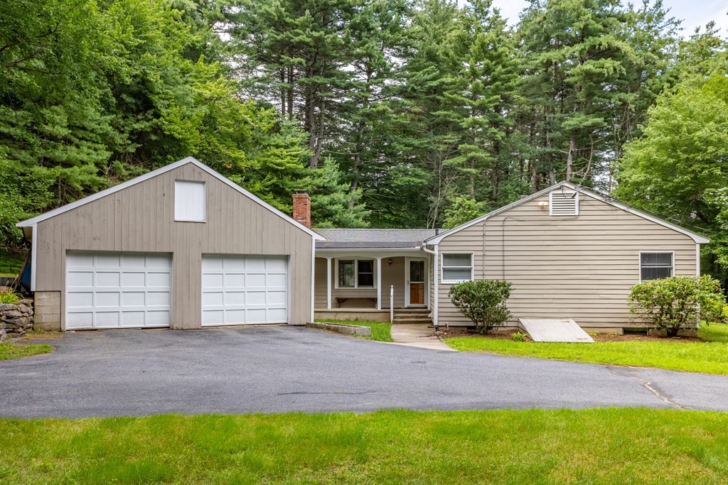 110 Middle Road Boxborough, MA 01719 - Photo 1 of 33 a front view of house with yard and green space