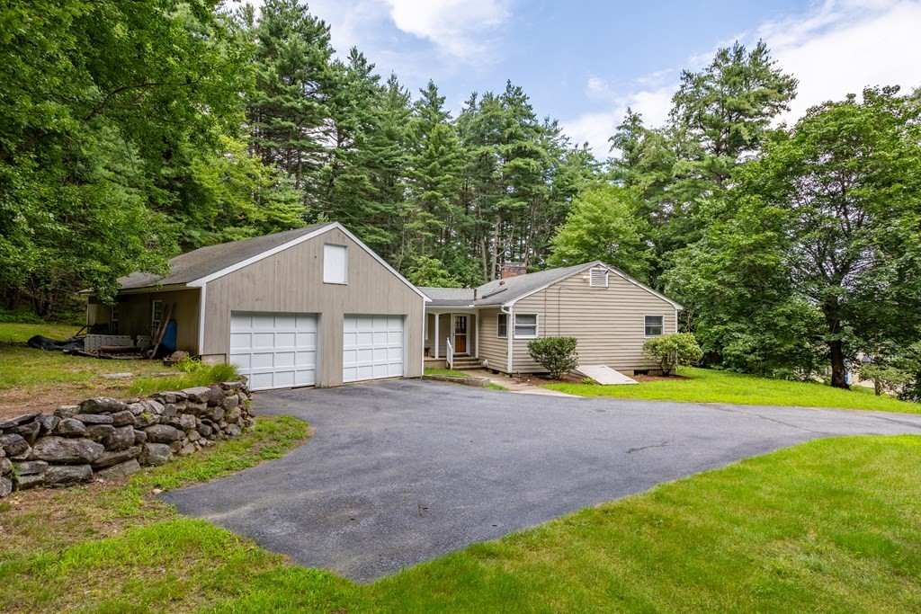 110 Middle Road Boxborough, MA 01719 - Photo 2 of 33 a view of a house with a yard and potted plants