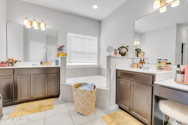 a room with a cabinets and washer