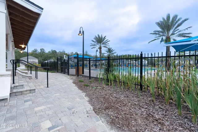 a view of a lake with a garden