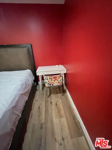 a balcony with wooden floor