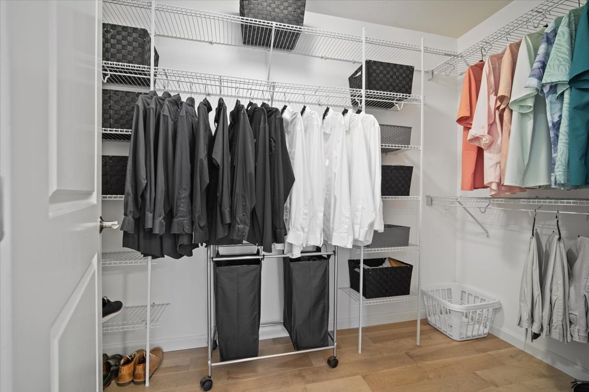 1423 Pine Forest Drive Normal, IL 61761 - Photo 17 of 23 a view of walk in closet with clothes