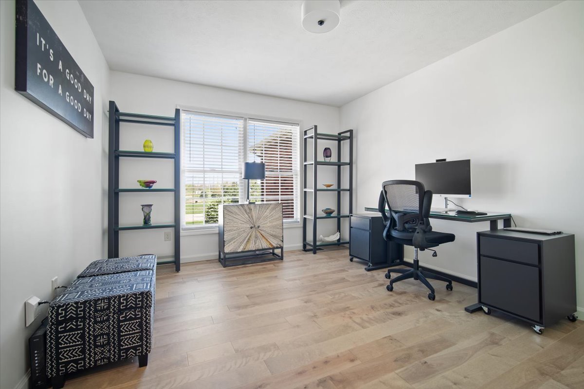 1423 Pine Forest Drive Normal, IL 61761 - Photo 18 of 23 a view of a livingroom with workspace and a window