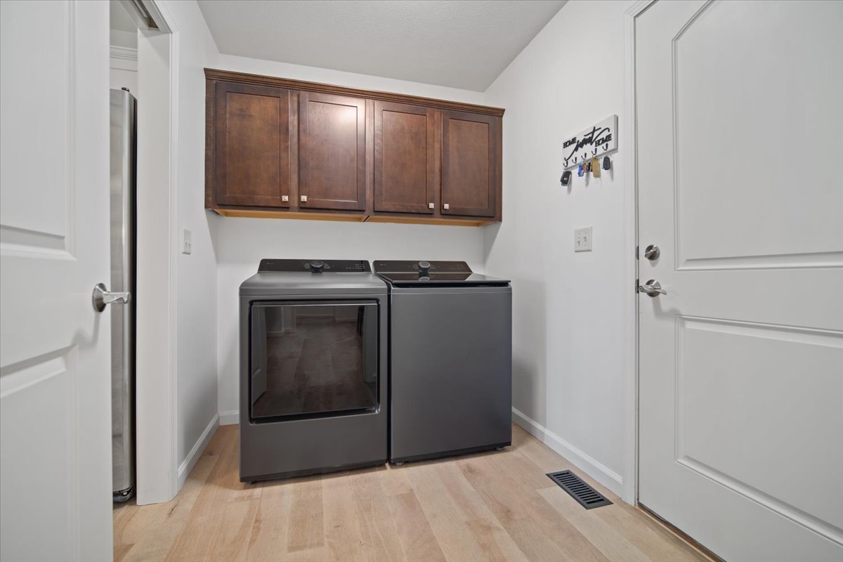 1423 Pine Forest Drive Normal, IL 61761 - Photo 21 of 23 a utility room with washer and dryer