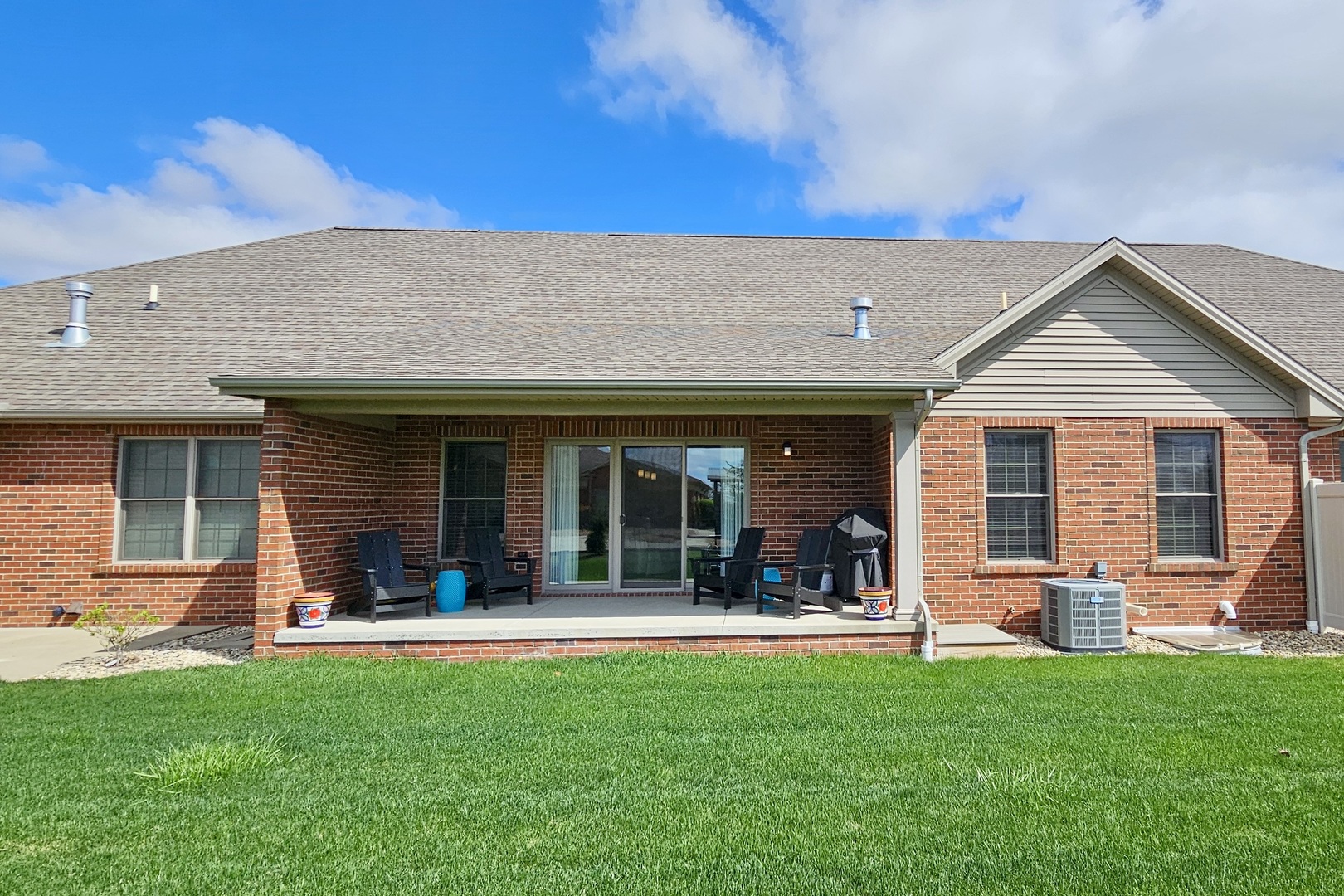 1423 Pine Forest Drive Normal, IL 61761 - Photo 22 of 23 a view of a house with a backyard