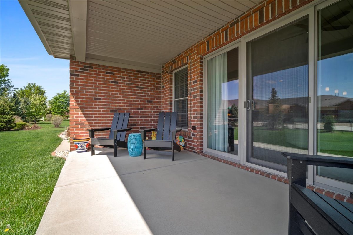 1423 Pine Forest Drive Normal, IL 61761 - Photo 23 of 23 a backyard of a house with outdoor seating