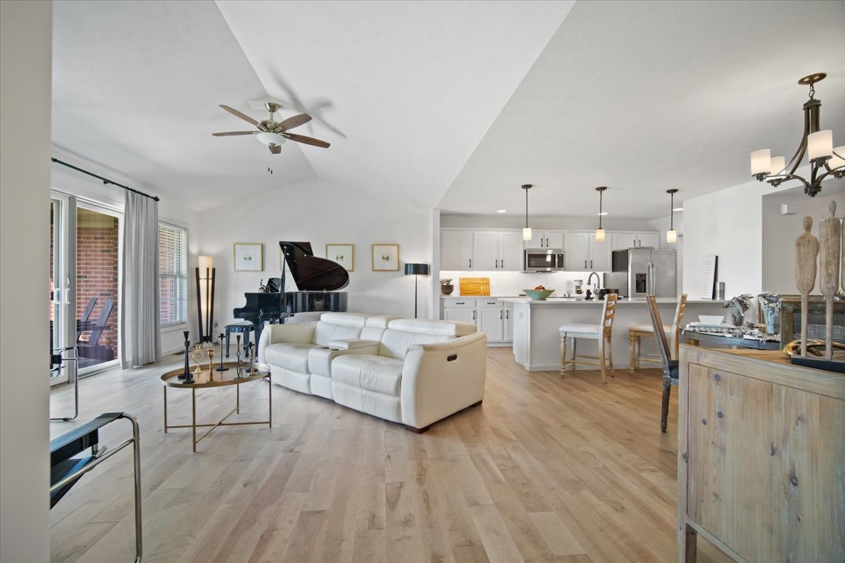 1423 Pine Forest Drive Normal, IL 61761 - Photo 3 of 23 a living room with furniture and kitchen view