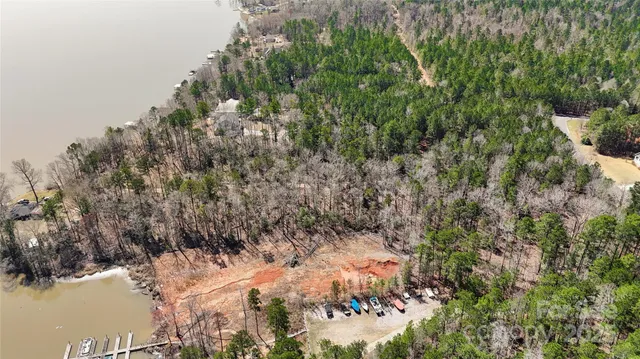 a view of a lake with lots of trees