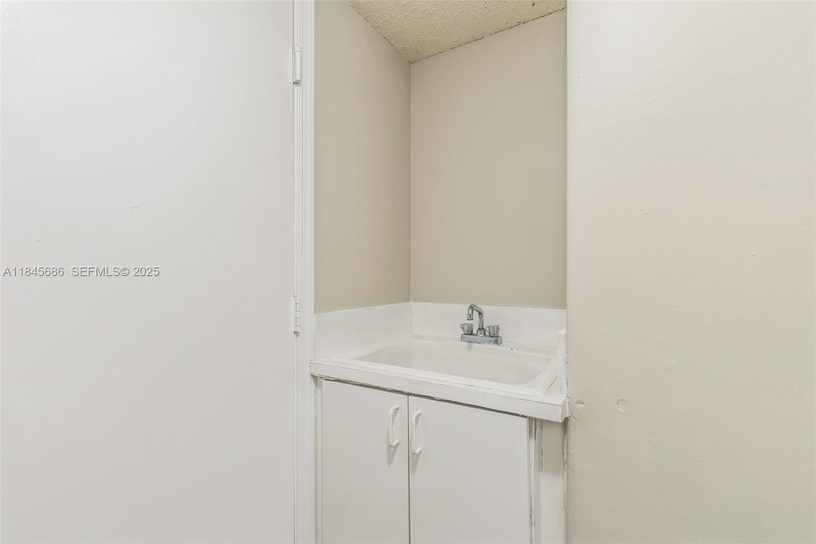 18091 Southwest 22nd Street Miramar, FL 33029 - Photo 19 of 41 a bathroom with a sink and a mirror