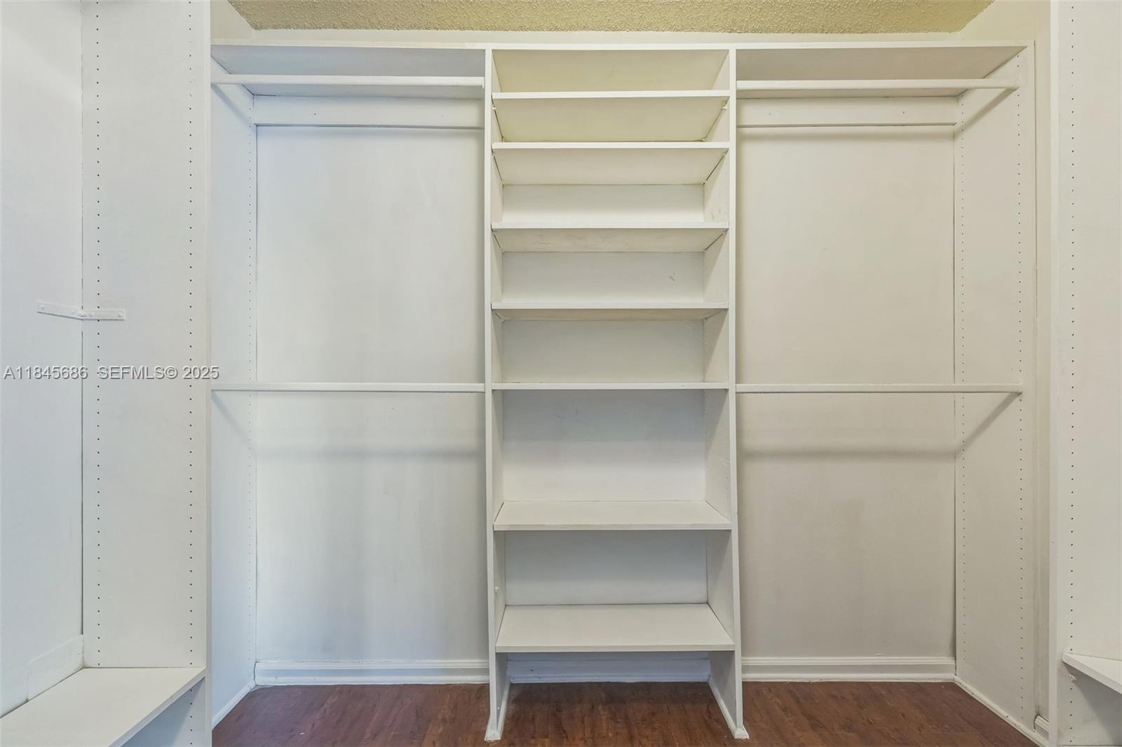 18091 Southwest 22nd Street Miramar, FL 33029 - Photo 21 of 41 a view of walk in closet with empty racks