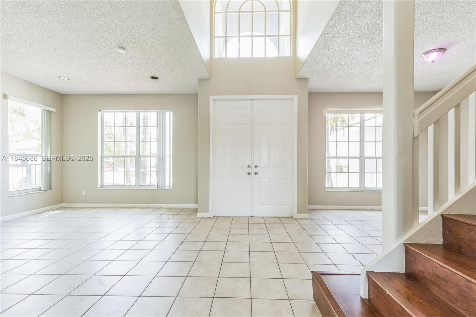 18091 Southwest 22nd Street Miramar, FL 33029 - Photo 3 of 41 a view of an empty room with a window