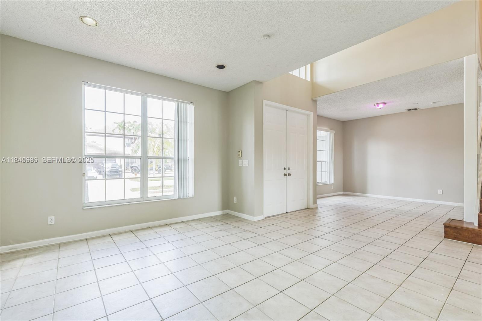 18091 Southwest 22nd Street Miramar, FL 33029 - Photo 4 of 41 a view of an empty room with window
