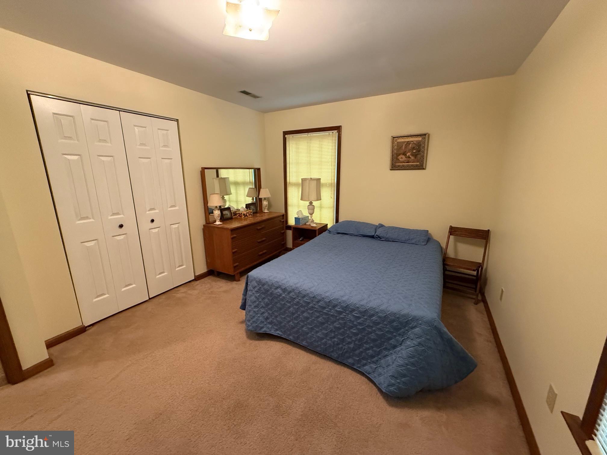 7206 Old Dickersons Road Orange, VA 22960 - Photo 14 of 32 a bedroom with a bed and dresser