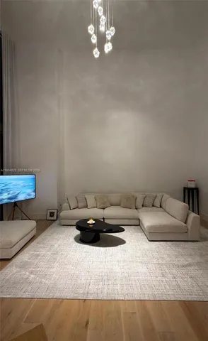 a view of a bedroom with furniture