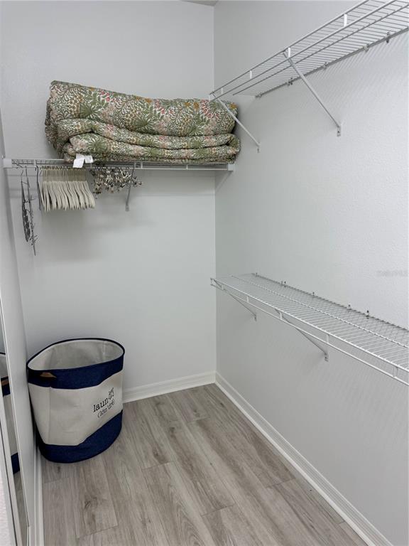 9122 Southwest 70th Loop Ocala, FL 34481 - Photo 20 of 31 a view of a room with racks on the wall