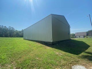256 Shepherd Hollow Road Indian Mound, TN 37079 - Photo 12 of 29 a backyard of a house with lots of green space