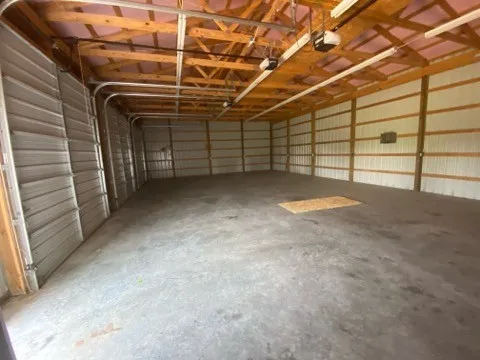 a view of a room with racks on the wall