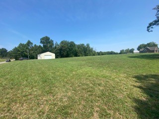 256 Shepherd Hollow Road Indian Mound, TN 37079 - Photo 5 of 29 a view of a field with an trees