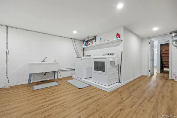 a view of a livingroom with wooden floor