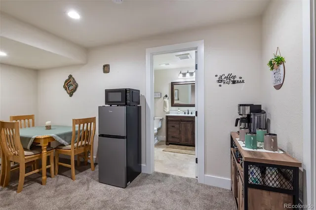 a view of a dining room with furniture