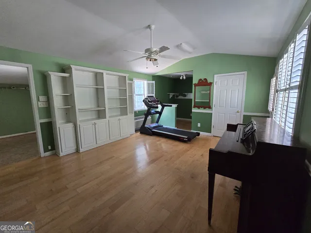 a view of livingroom with bathroom and windows