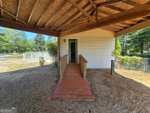 a house with trees in the background